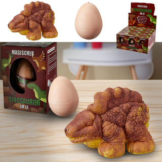 Magischer Dino im Ei 12 Stück im Display 7,5x10,5x5cm Kunststoff 6 Motive schlüpfende Dinos magisch Spielfigur